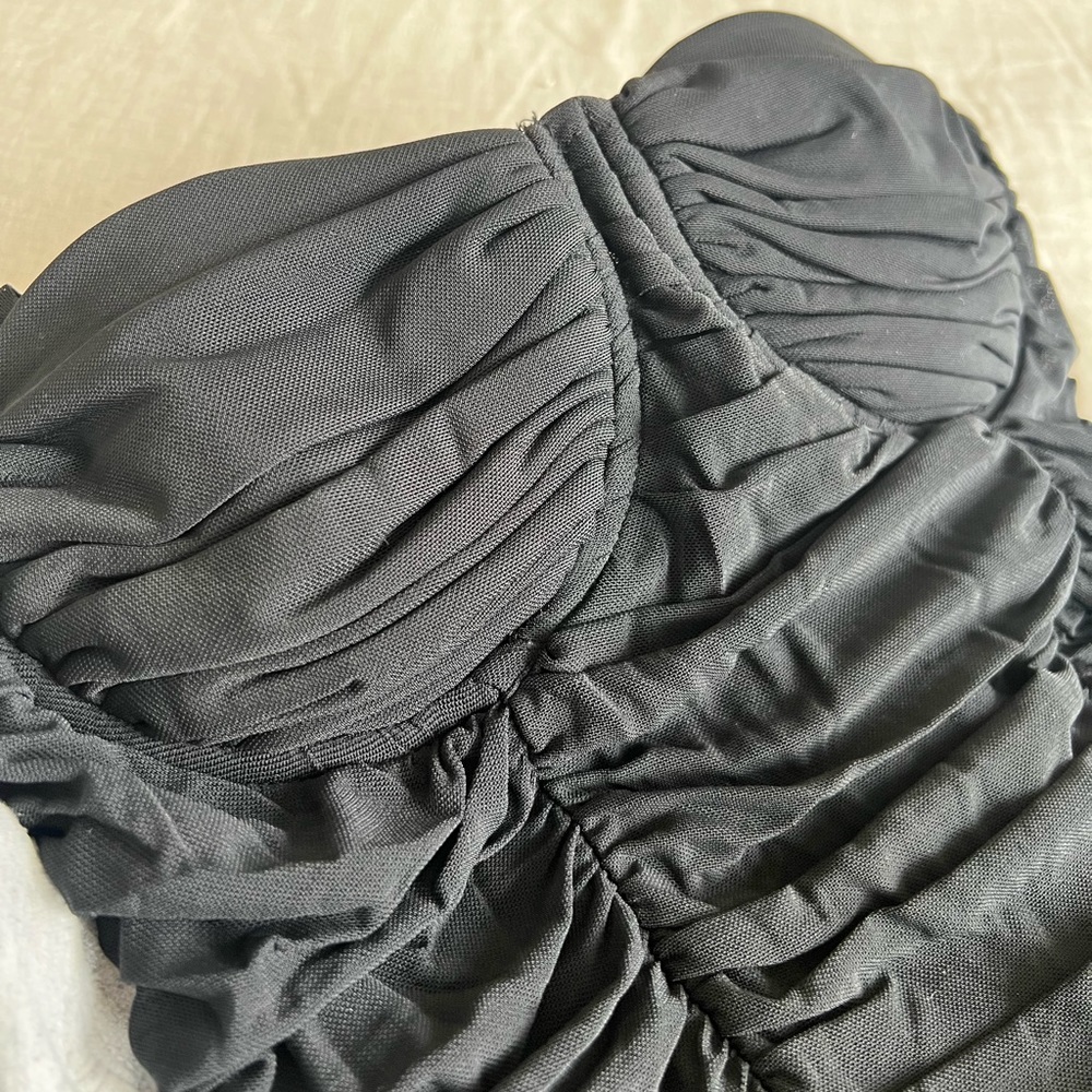 A black mesh bodycon dress